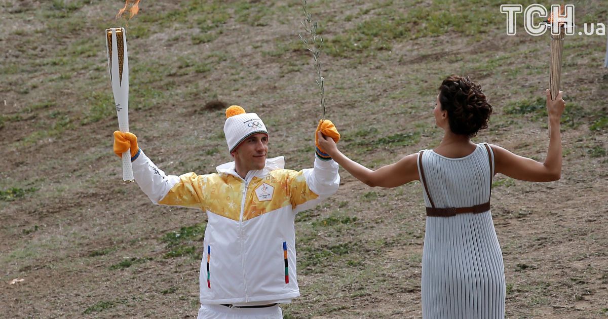 Передача олімпійського воню / © Reuters