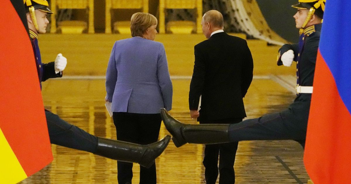 Колишній канцлер Німеччини Ангела Меркель та президент Росії Володимир Путін