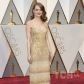 Сложные дизайны, разрезы и элегантность: в каких платьях Эмма Стоун появлялась на "Оскаре"