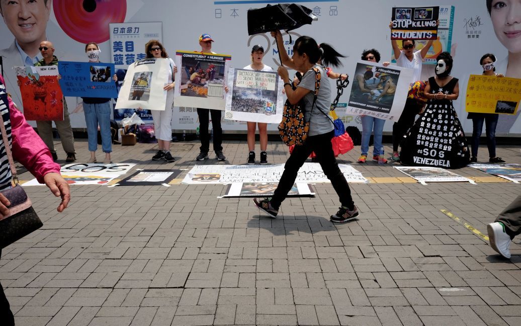 Венесуэльцы в Гонконге / © Reuters