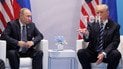 Фірмові "лещата" Трампа і задумливий Путін. Фото першої зустрічі президентів