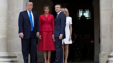 Стрункі ніжки і контрастні сукні: як Трамп і Макрон дружинами хизувалися_13 / © Reuters