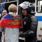 Прапори і кийки: як у Росії мітингувальників в автозаки "пакували"