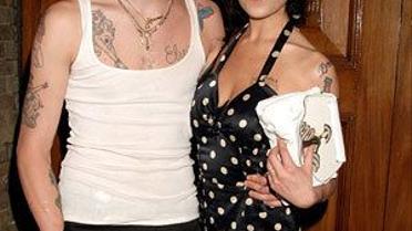 Чоловіка Емі засудили (без коментарів. Reuters)