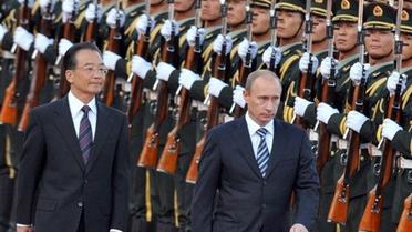 Путіна в Китаї зустріли залпами гармат