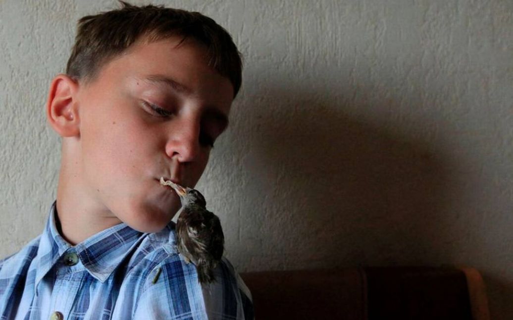 Вадим і його горобець Абі / © bigpicture.ru