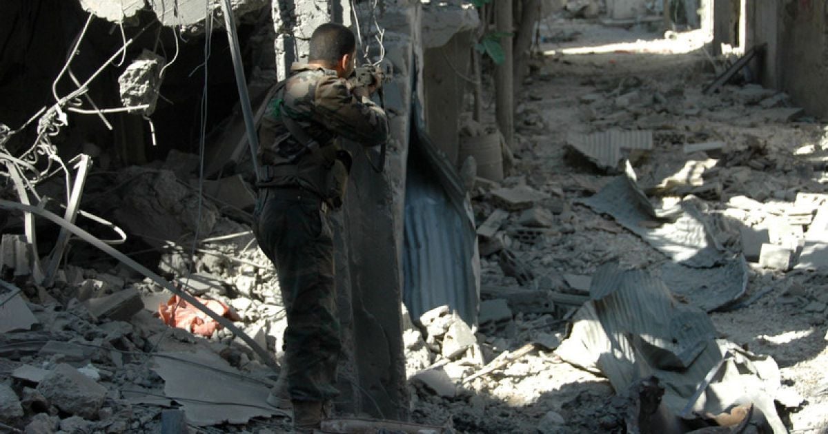 Сирійський Хомс знищений / © Фото EPA/UPG