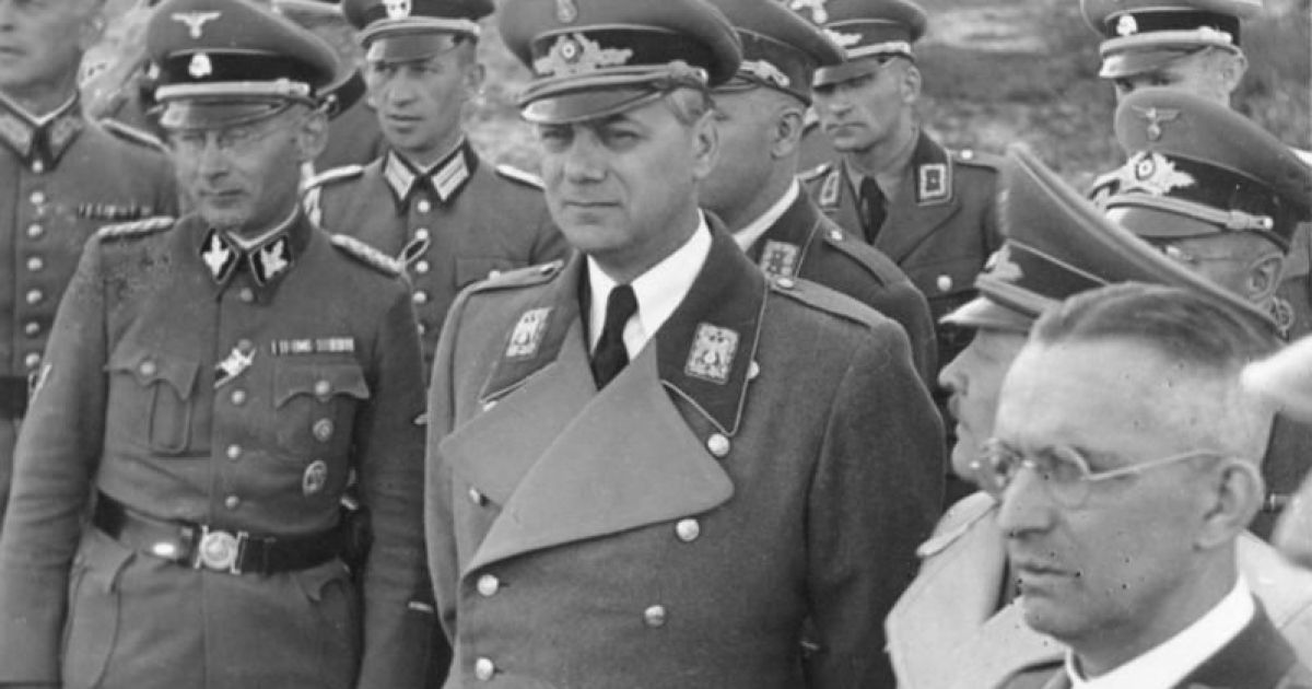 Альфред Розенберг (у центрі) разом з Альфредом Майєром та Еріком Кохом