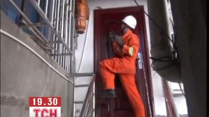 Ящірка залізла у будинок китаянки