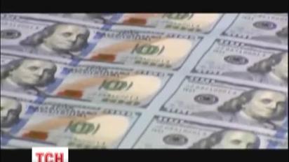 США випускають нову 100-долларову купюру