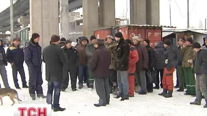 Сім місяців без зарплати працюють столичні будівельники