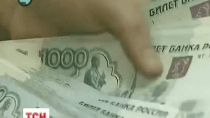 Российские деньги упали до рекордных показателей