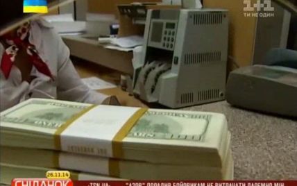 Банки списывают украинцам львиные части валютных кредитов за наличные