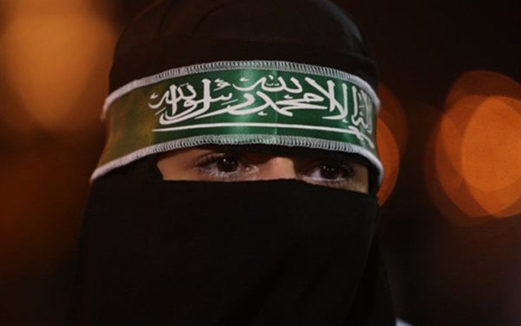 Жінка бере участь у святкуванні Національного дня Саудівської Аварії у столиці Ер-Ріаді. Національний день є єдиним світським святом Арабського Королівства, та щороку піддається жорсткій критиці священнослужителів. / © AFP