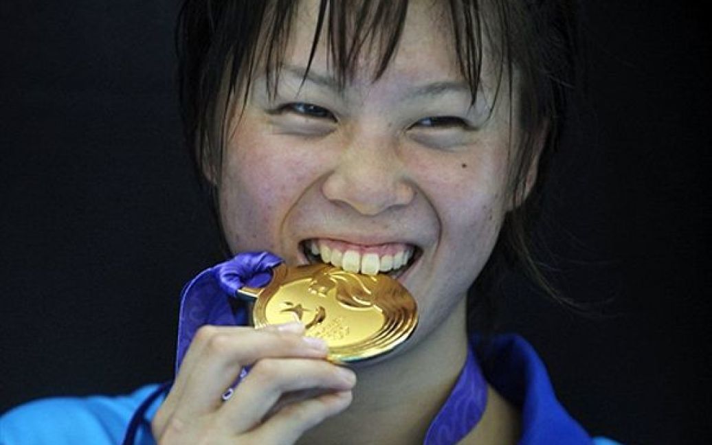 Золота медалістка тріатлону серед дівчат Юка Сато з Японії. / © AFP