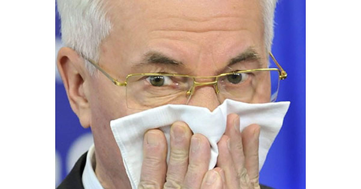 Бельгія, Брюссель. Український прем'єр-міністр Микола Азаров під час виголошення промови на спільній прес-конференції з європейським комісаром з питань розширення і політики сусідства Штефаном Фюле. Азаров і Фюле підписали меморандум про всеосяжну постприватизаційну програму. / © AFP