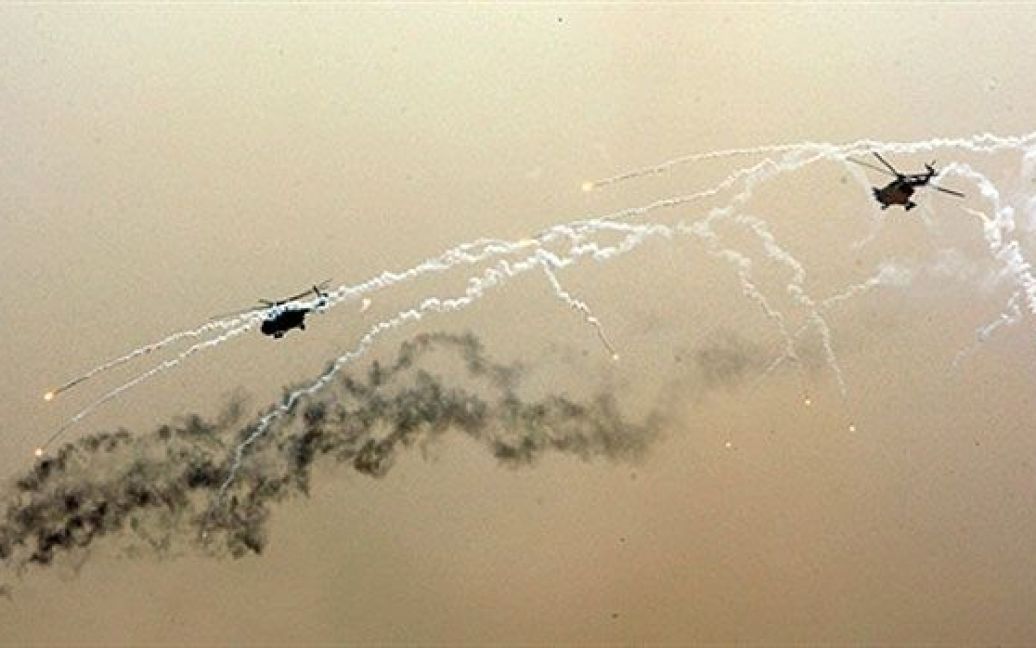 Ірак, Багдад. Іракські вертольоти російського виробництва стріляють під час початку спільної іраксько-американської військової операції "Стрибок лева". / © AFP