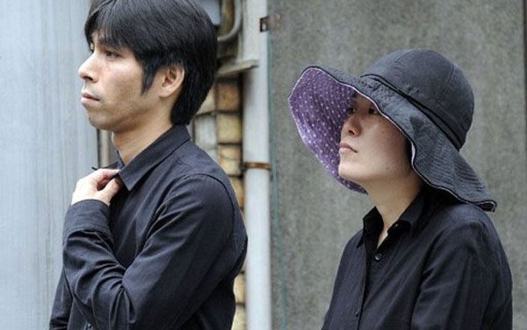 Церемонія розірвання шлюбу в Японії являє собою ритуал, коли подружжя розбивають свої обручки молотком. / © AFP