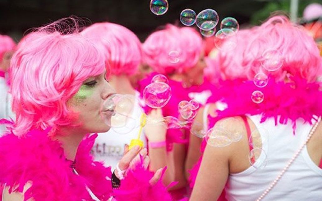 В Ризі провели парад білявок, присвячений Міжнародному дню блондинки / © AFP