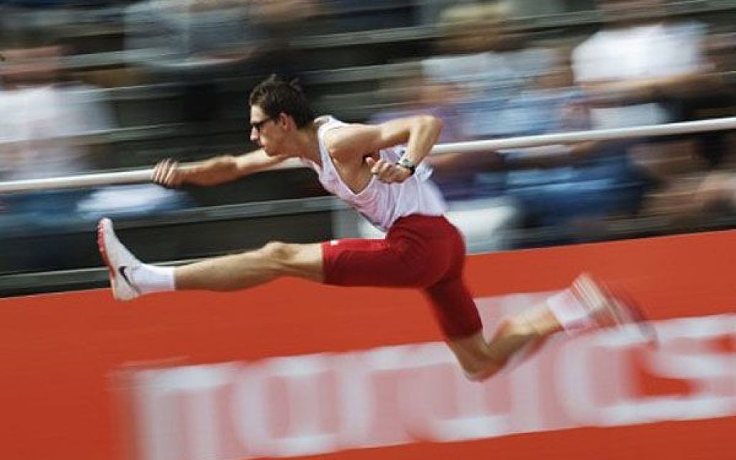 Швеція, Стокгольм. Польський спортсмен Рафал Островські виступає у забігу на 400 м з бар&#039;єрами серед чоловіків під час Чемпіонату Європи в Стокгольмі. / © AFP