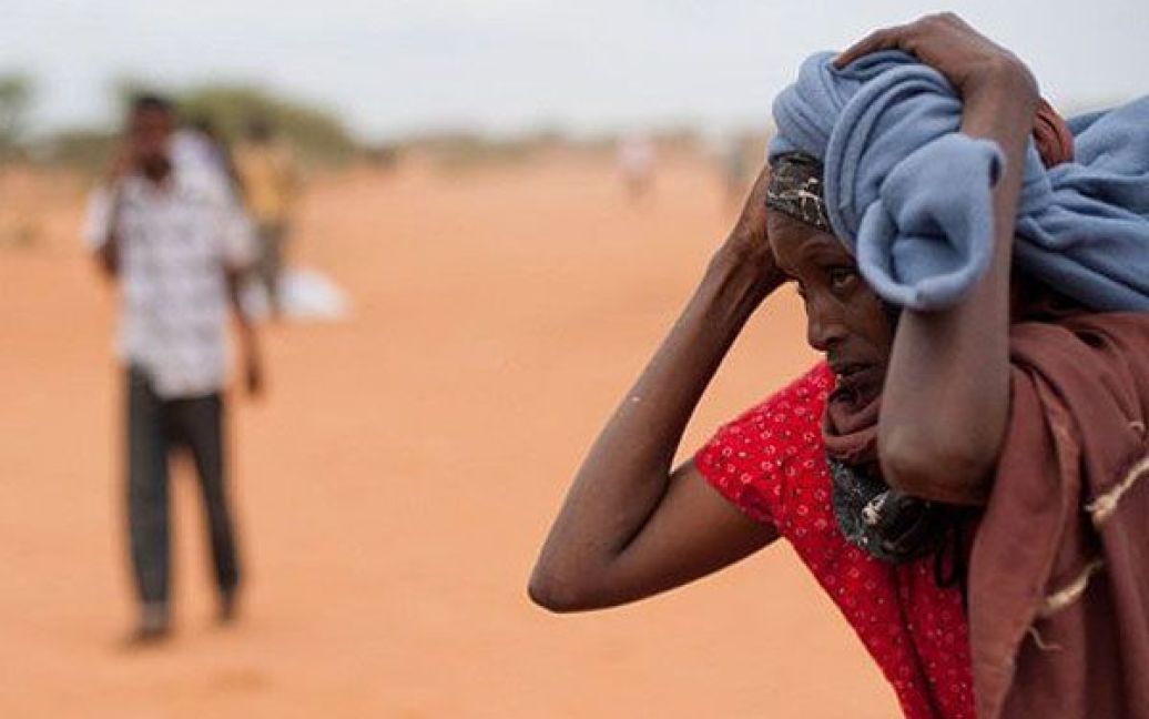 Кенія, Дадааб. Табір біженців у Дадаабі переповнено через величезний приплив людей, які рятуються від посухи і голоду в Сомалі. ООН закликала світ врятувати мільйони людей, постраждалих від посухи у регіоні Африканського Рогу. / © AFP