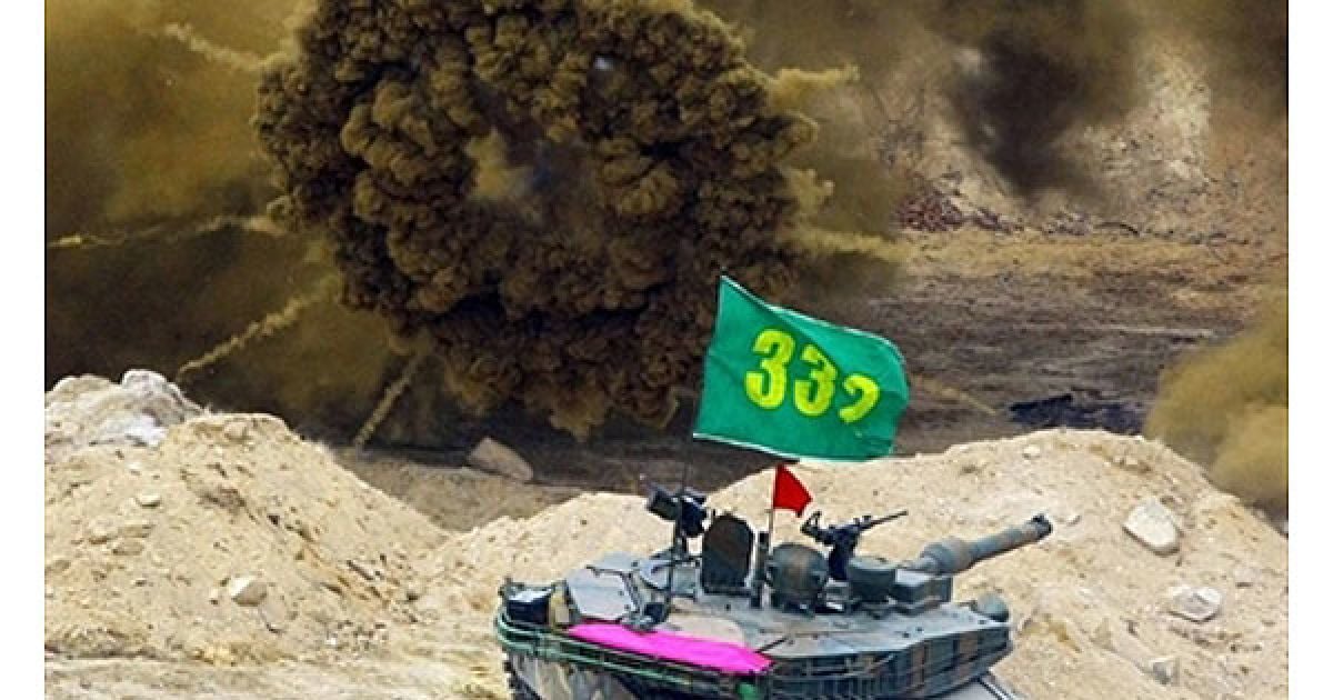 Республіка Корея, Почеон. Південнокорейський танк K1A1 робить постріл під час навчань у Почеоні. / © AFP