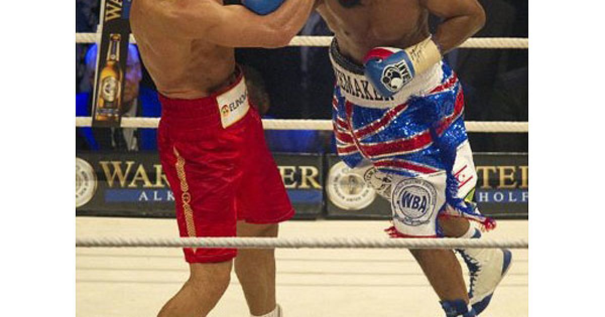 Українець Володимир Кличко став абсолютним чемпіоном світу з боксу, здобувши перемогу над Девідом Хеєм у об&#039;єднавчому поєдинку за пояси IBF/IBO, WBO і WBA. / © AFP