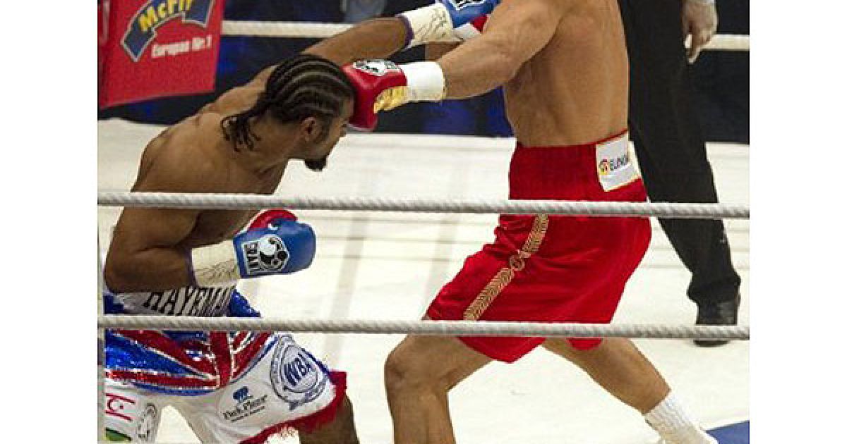 Українець Володимир Кличко став абсолютним чемпіоном світу з боксу, здобувши перемогу над Девідом Хеєм у об&#039;єднавчому поєдинку за пояси IBF/IBO, WBO і WBA. / © AFP
