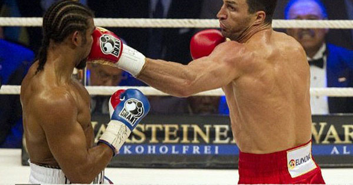 Українець Володимир Кличко став абсолютним чемпіоном світу з боксу, здобувши перемогу над Девідом Хеєм у об&#039;єднавчому поєдинку за пояси IBF/IBO, WBO і WBA. / © AFP