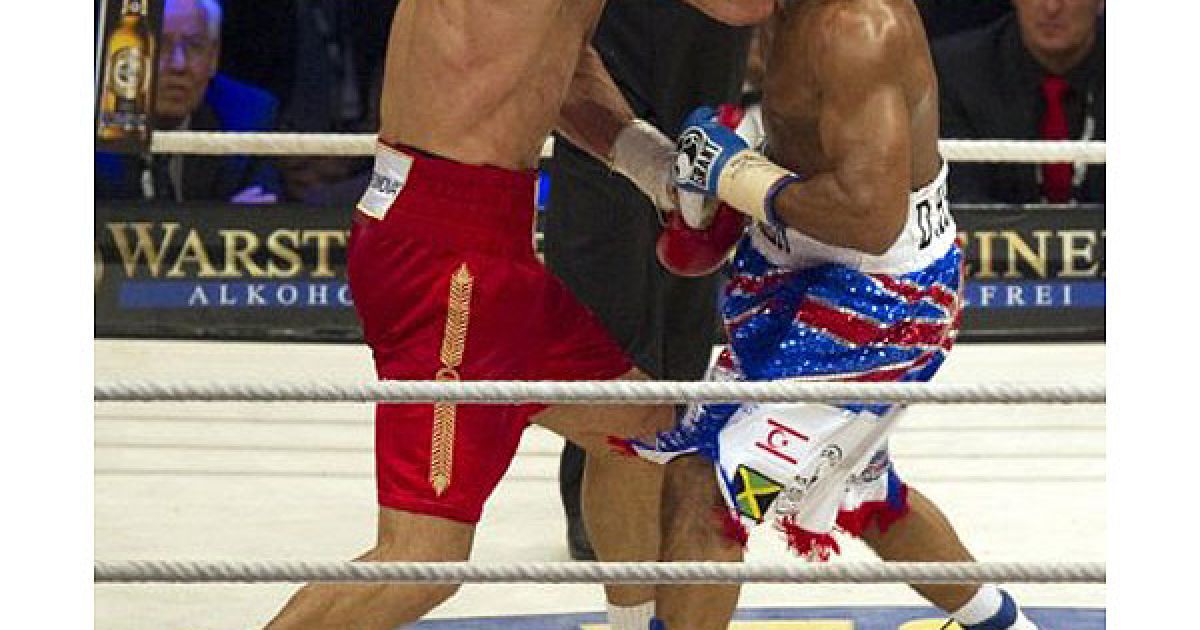 Українець Володимир Кличко став абсолютним чемпіоном світу з боксу, здобувши перемогу над Девідом Хеєм у об&#039;єднавчому поєдинку за пояси IBF/IBO, WBO і WBA. / © AFP