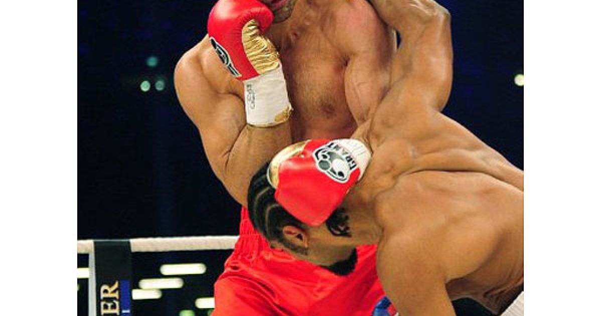 Українець Володимир Кличко став абсолютним чемпіоном світу з боксу, здобувши перемогу над Девідом Хеєм у об&#039;єднавчому поєдинку за пояси IBF/IBO, WBO і WBA. / © AFP