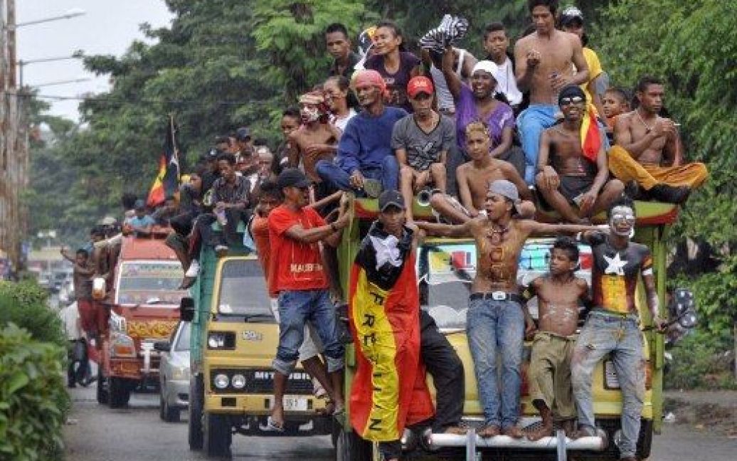 Східний Тимор, Ділі. Прихильники руху "Фретілін" беруть участь у кампанії на підтримку колишнього лідера партизан Фернандо "Лу Оло" Гутерріша на президентських виборах. / © AFP