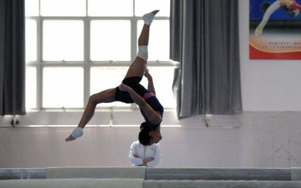 Тренування гімнасток у спортшколі / © AFP