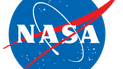 NASA показало невероятное фото МКС на фоне полной Луны