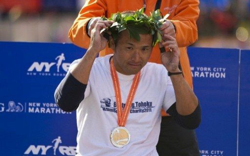 Японець Масазумі Соуджима став найкращим у марафоні серед чоловіків на візках / © AFP