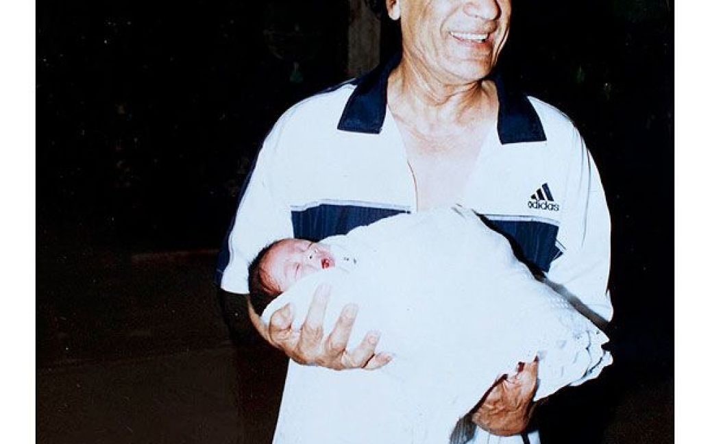 Полковник Муаммар Каддафі з дитиною. / © The New York Times