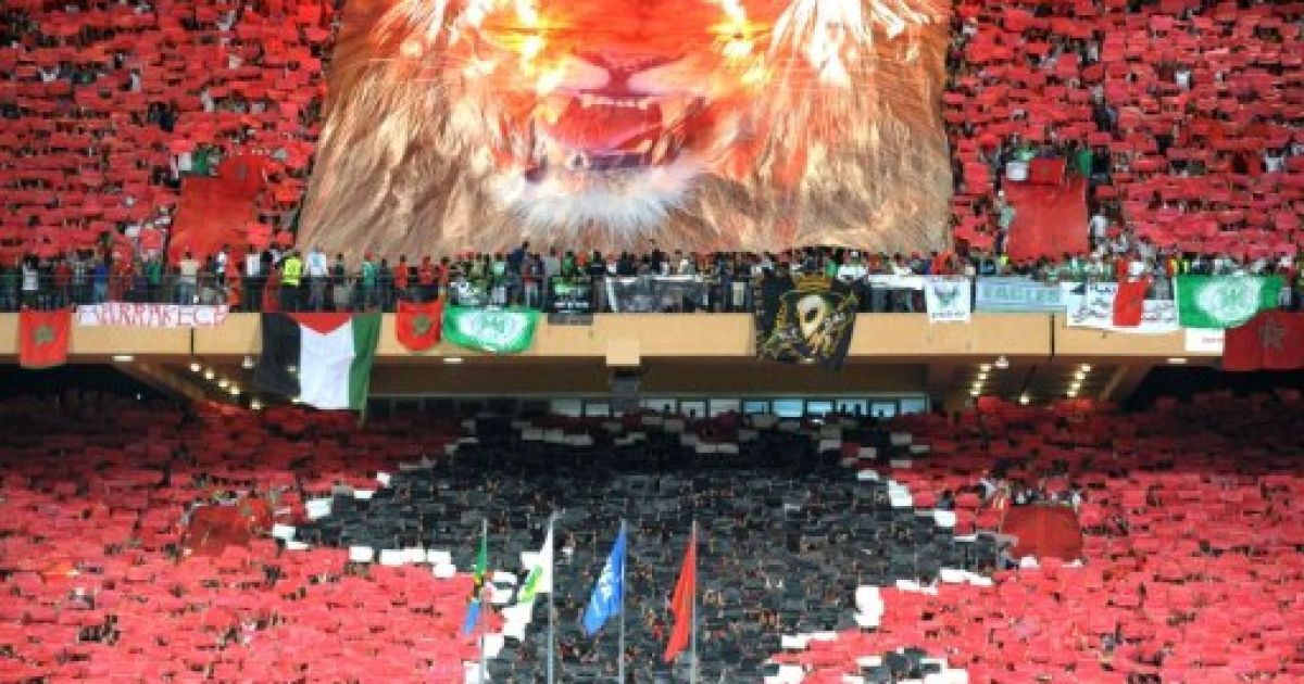 Марокко, Марракеш. Марокканські фанати святкують перемогу своєї команди над командою Танзанії у матчі на Кубок Африканських Націй в Марракеші. / © AFP