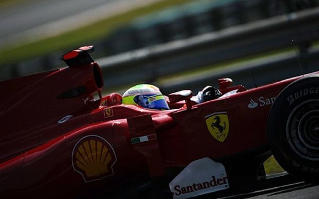 30.07. Пілот команди Ferrari Феліпе Масса бере участь у тренуванні перед Гран-прі Угорщини Формули 1 у Будапешті. / © AFP