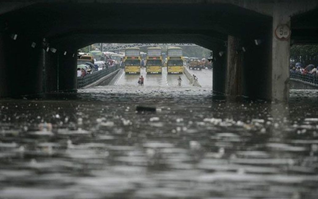 Провінція Цзянсі гна сході Китаю потерпає від повені, викликаної зливами. / © AFP