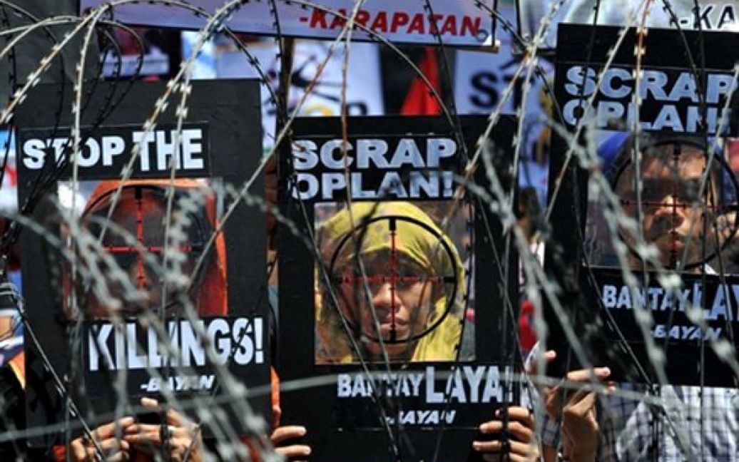Маніла. Демонстрація з вимогою розслідування справ про політичні вбивства. Да даними демонстрантів, за останні 9 років на Філіппінах було вбито більше 900 активістів опозиційних організацій. / © AFP