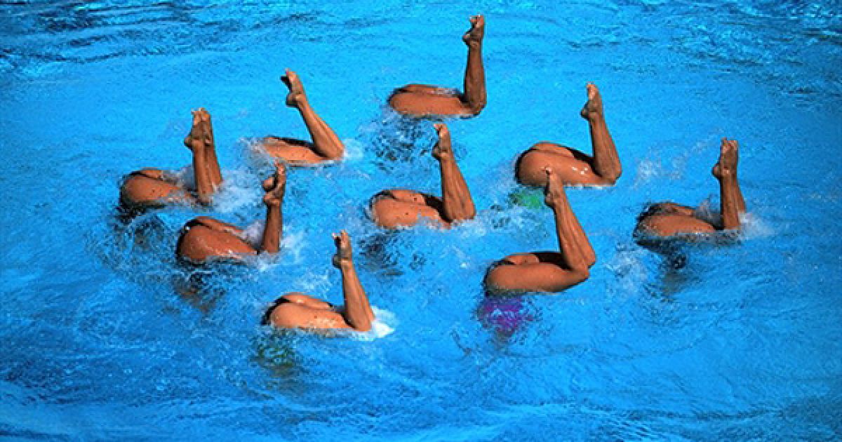 Виступ мексиканської збірної синхроністок у фіналі змагань з синхронного плавання на Центральноамериканських іграх у Пуерто-Ріко. / © AFP