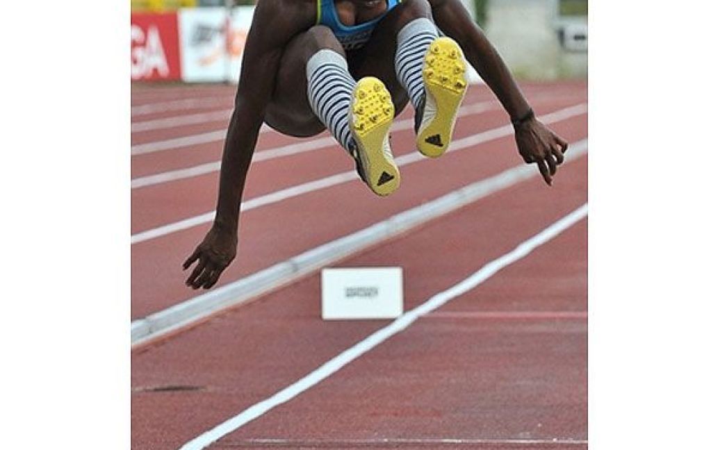 Кубінська легкоатлетка Савінь Яргеліс виконує потрійний стрибок / © AFP