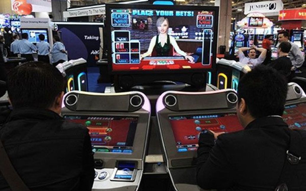 Останні розробки у галузі гральних автоматів були представлені на виставці "Global Gaming Expo" у Макау (Китай). / © AFP