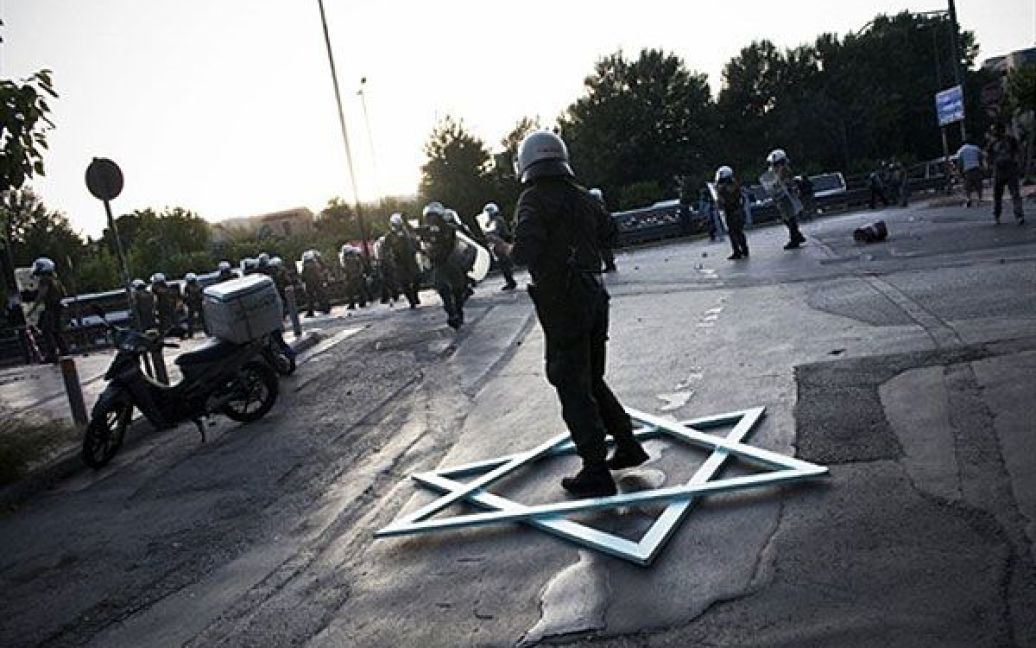 Греція, Афіни. Поліцейські розігнали антиізраїльську акцію протесту в Афінах. / © AFP