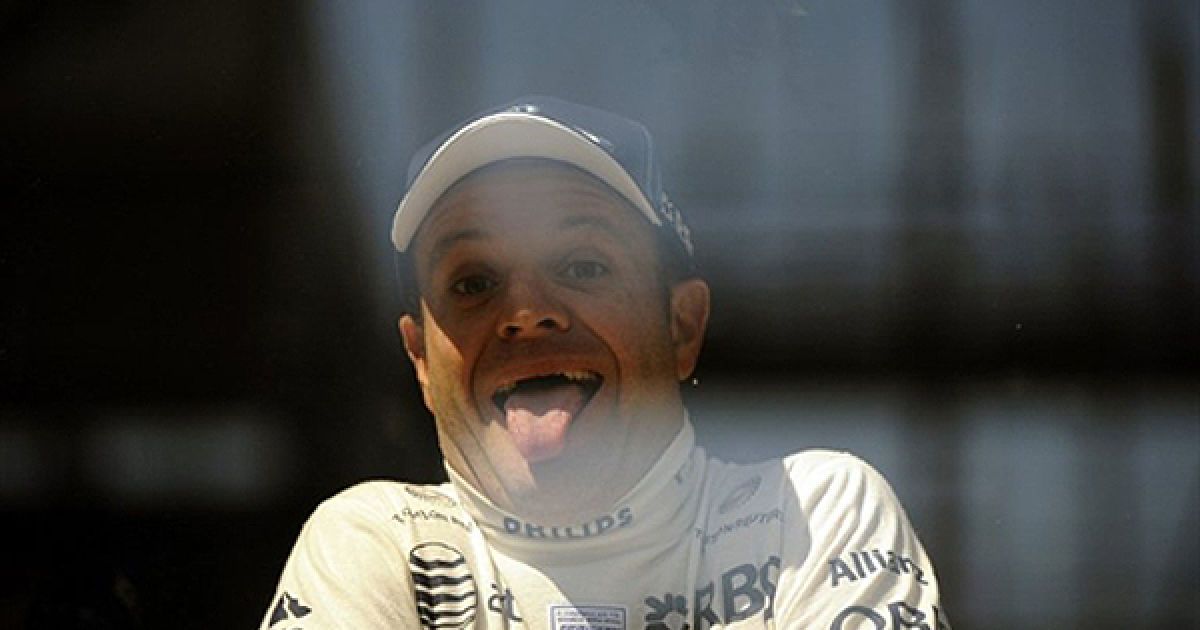 13.05. Монте-Карло. Пілот команди Williams Рубенс Баррікелло сміється під час тренування перед Гран-прі Монако Формули 1, яке відбулося 16 травня. / © AFP