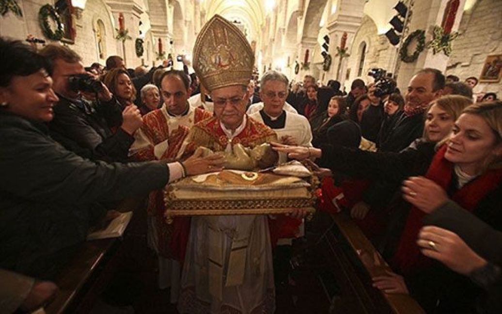 Віфлеєм. 25 грудня римо-католики, більшість протестантів і представники деяких православних конфесій святкують Різдво. / © AFP