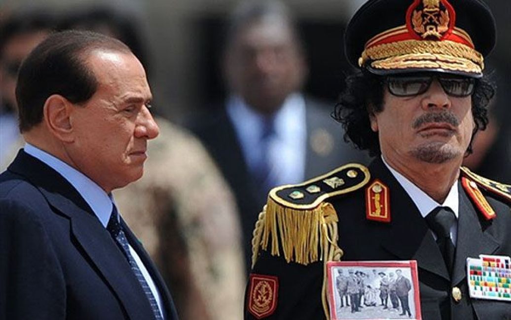 Прем&rsquo;єр-міністр Італії Сільвіо Берлусконі та лідер Лівії Муаммар Каддафі. / © AFP