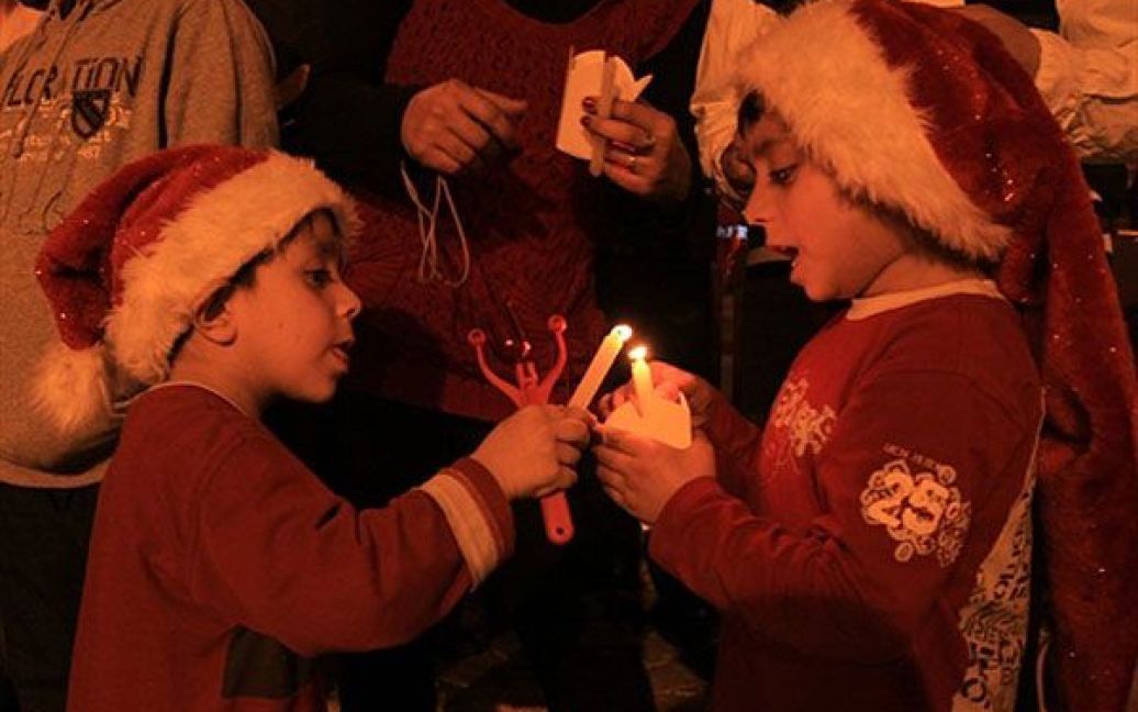 25 грудня римо-католики, більшість протестантів і представники деяких православних конфесій святкують Різдво. / © AFP