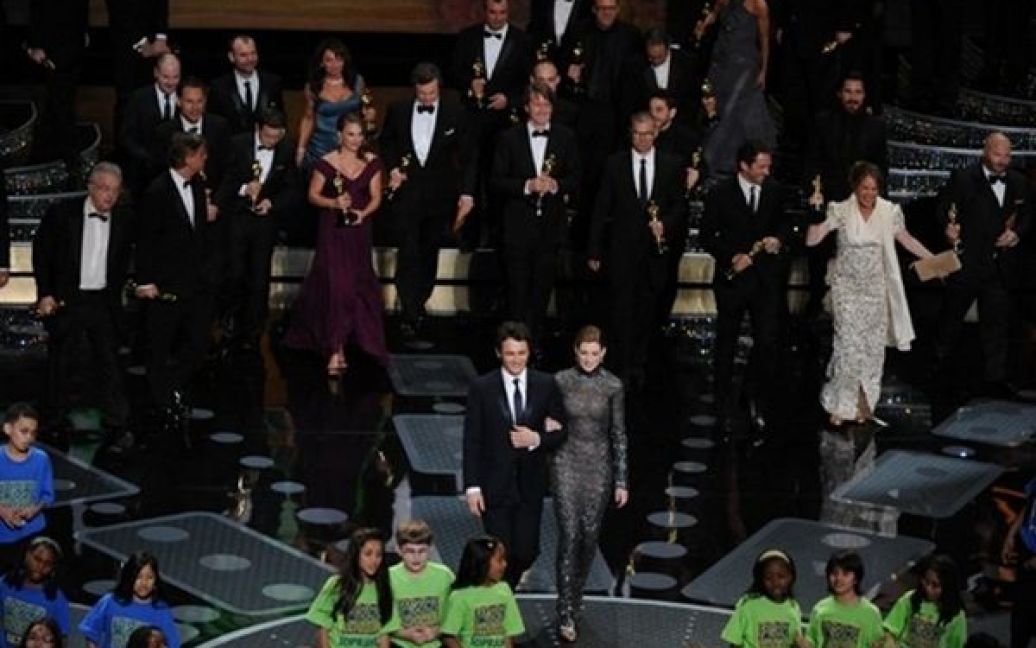 Головну нагороду "Оскар" у номінації "Найкращий фільм року" отримав фільм "Король каже!". Найкращими акторами стали Наталі Портман та Колін Ферт. / © AFP