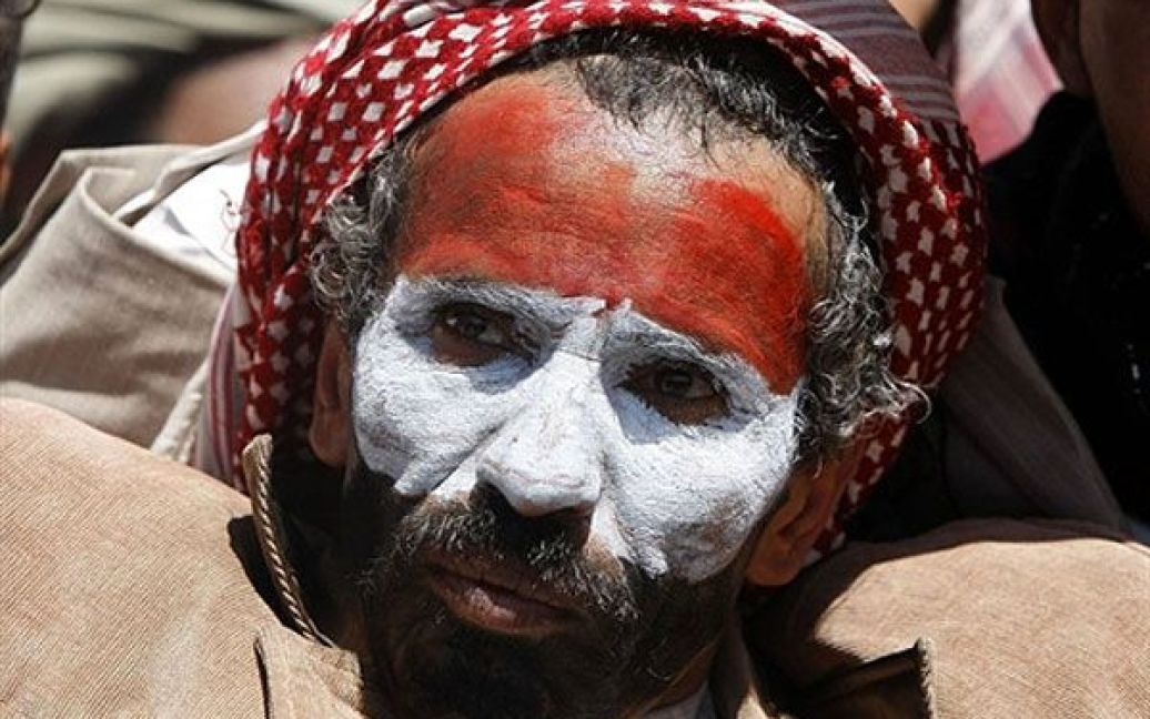 Ємен, Сана. Єменський демонстрант із пофарбованим обличчям бере участь у акції протесту проти президента країни Алі Абдалли Салеха. / © AFP